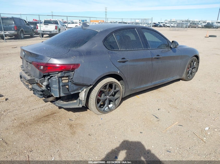 2019 Alfa romeo Giulia VIN ZARFANBN2K7612097 IAAI salvage auction — LEFT SIDE, Original (Texas), sold $4,500 on 2026-07-13 (photo 4)
