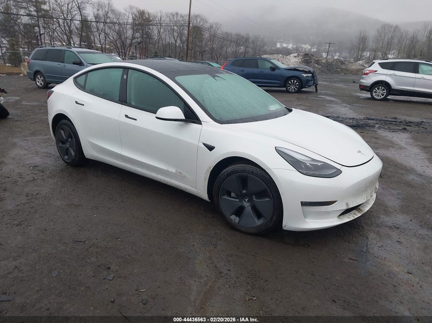 2022 Tesla Model 3 VIN 5YJ3E1EB7NF207931 IAAI salvage auction — LEFT FRONT, Salvage Title, sold $9,800 on 2026-08-01 (photo 1)