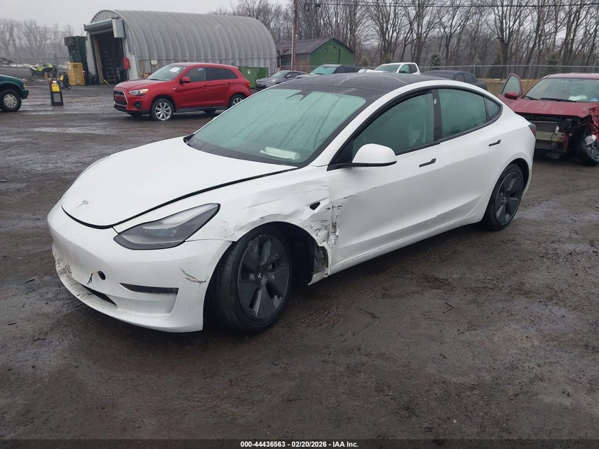 2022 Tesla Model 3 VIN 5YJ3E1EB7NF207931 IAAI salvage auction — LEFT FRONT, Salvage Title, sold $9,800 on 2026-08-01 (photo 2)