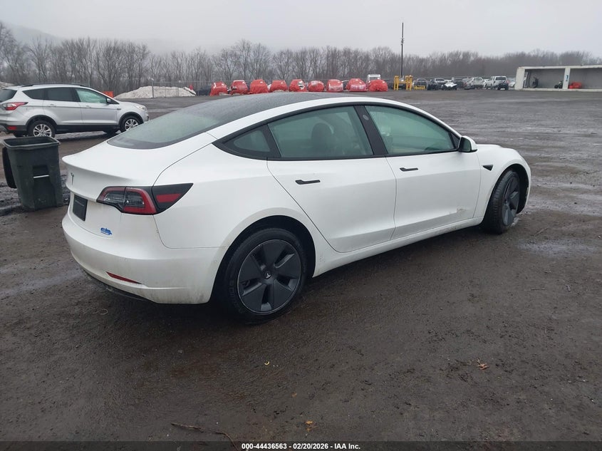2022 Tesla Model 3 VIN 5YJ3E1EB7NF207931 IAAI salvage auction — LEFT FRONT, Salvage Title, sold $9,800 on 2026-08-01 (photo 4)