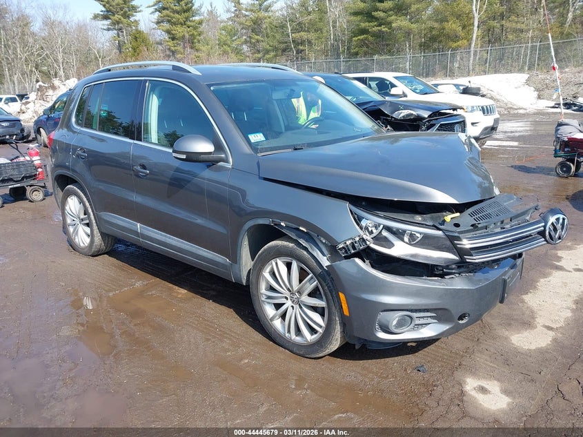 2014 Volkswagen Tiguan VIN WVGAV3AXXEW605162 IAAI salvage auction — LEFT FRONT, Salvage Title, sold $1,050 on 2026-07-10 (photo 1)