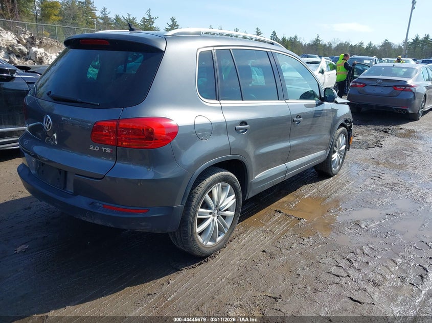 2014 Volkswagen Tiguan VIN WVGAV3AXXEW605162 IAAI salvage auction — LEFT FRONT, Salvage Title, sold $1,050 on 2026-07-10 (photo 4)