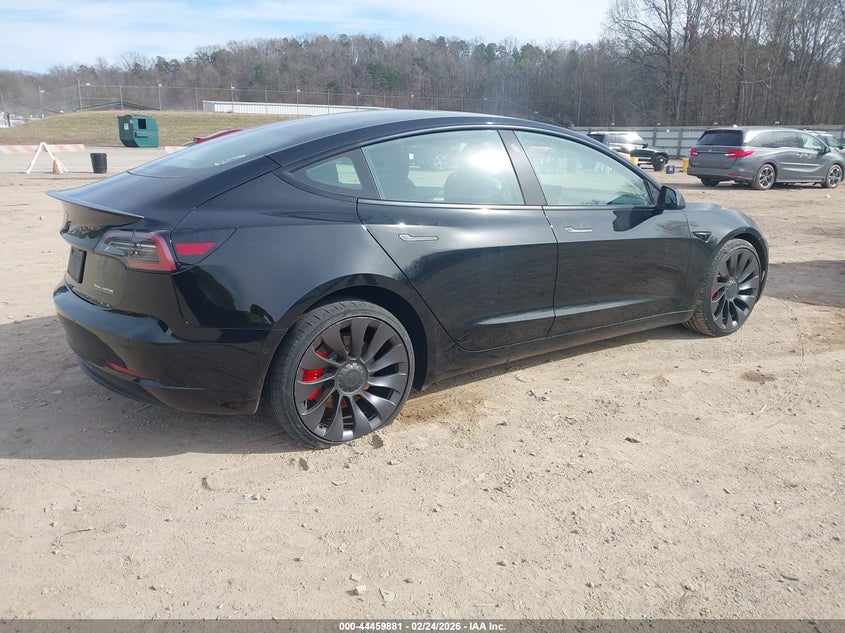 2021 Tesla Model 3 VIN 5YJ3E1EC7MF030188 IAAI salvage auction — REAR END, Salvage Title, sold $10,100 on 2026-07-22 (photo 4)