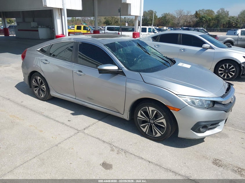 2018 Honda Civic VIN JHMFC1F35JX005582 IAAI salvage auction — UNKNOWN, Salvage Title, sold $1,800 on 2026-07-08 (photo 1)