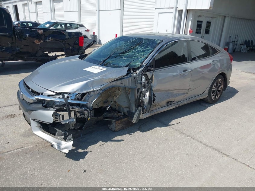 2018 Honda Civic VIN JHMFC1F35JX005582 IAAI salvage auction — UNKNOWN, Salvage Title, sold $1,800 on 2026-07-08 (photo 2)