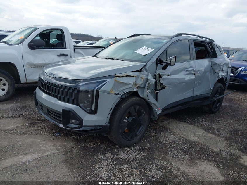 2026 Kia Sportage VIN 5XYK6CDF0TG370306 IAAI salvage auction — SIDE, Clear (Oklahoma), sold $11,100 on 2026-07-28 (photo 2)