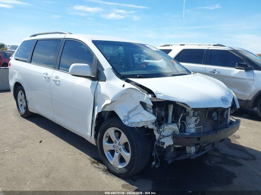 2014 Toyota Sienna VIN 5TDKK3DC8ES519827 IAAI salvage auction — RIGHT FRONT, Salvage Title, sold $1,400 on 2026-07-14 (photo 1)