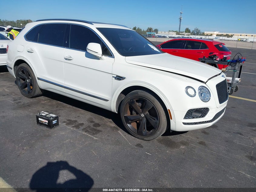 2018 Bentley Bentayga VIN SJAAC2ZV0JC018473 IAAI salvage auction — Water/Flood, Rebuildable (Florida), sold $28,250 on 2026-05-18 (photo 1)