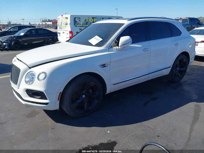 2018 Bentley Bentayga VIN SJAAC2ZV0JC018473 IAAI salvage auction — Water/Flood, Rebuildable (Florida), sold $28,250 on 2026-05-18 (photo 2)