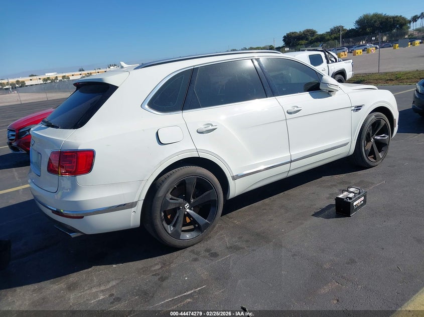 2018 Bentley Bentayga VIN SJAAC2ZV0JC018473 IAAI salvage auction — Water/Flood, Rebuildable (Florida), sold $28,250 on 2026-05-18 (photo 4)