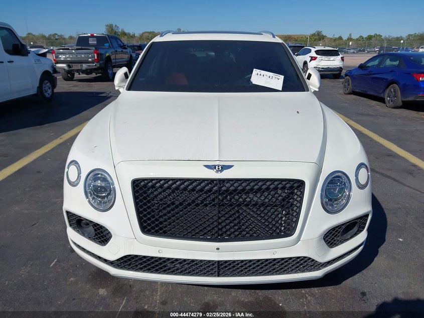 2018 Bentley Bentayga VIN SJAAC2ZV0JC018473 IAAI salvage auction — Water/Flood, Rebuildable (Florida), sold $28,250 on 2026-05-18 (photo 6)