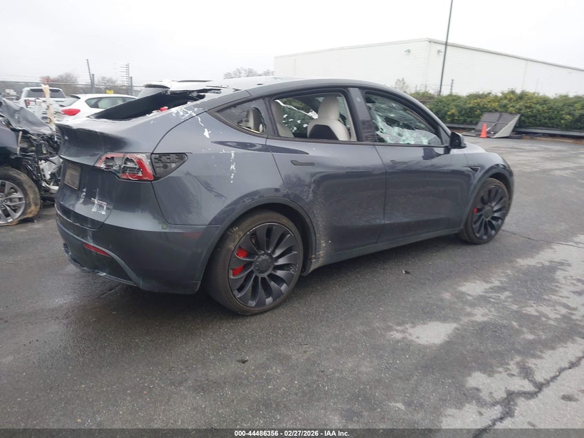 2022 Tesla Model y VIN 7SAYGDEF1NF442025 IAAI salvage auction — VANDALISM, Salvage Title, sold $7,825 on 2026-07-09 (photo 4)