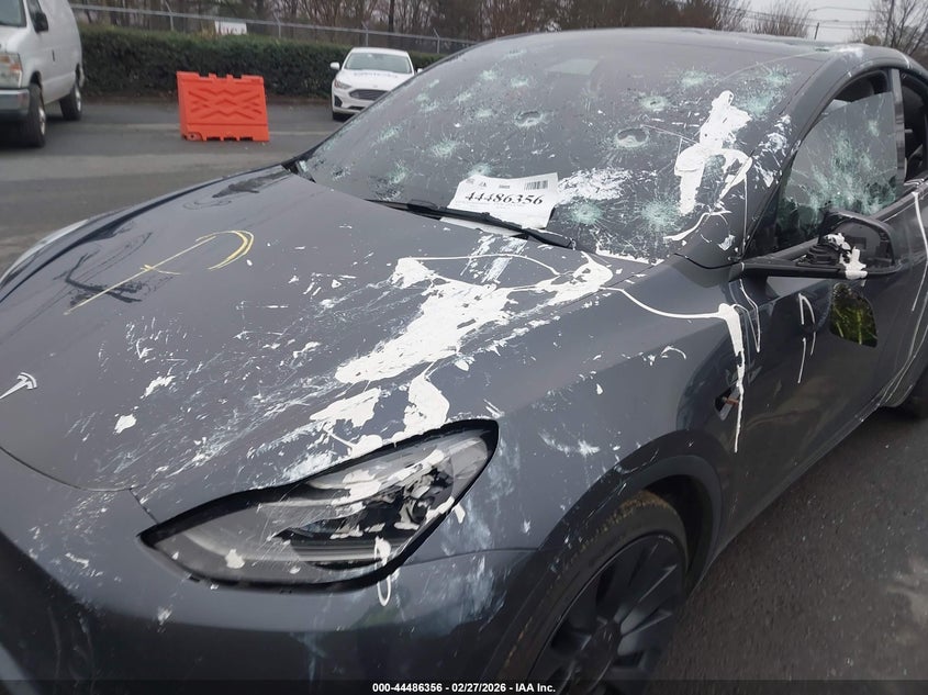 2022 Tesla Model y VIN 7SAYGDEF1NF442025 IAAI salvage auction — VANDALISM, Salvage Title, sold $7,825 on 2026-07-09 (photo 6)