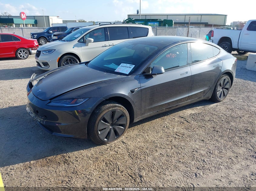 2025 Tesla Model 3 VIN 5YJ3E1EA8SF997792 IAAI salvage auction — RIGHT SIDE, Salvage Title, sold $9,100 on 2026-07-23 (photo 2)