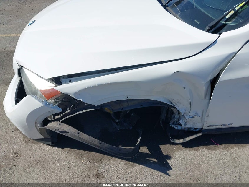 2014 BMW X1 VIN WBAVM1C55EVW48285 IAAI salvage auction — LEFT FRONT, Salvage Title, sold $1,000 on 2026-07-06 (photo 6)