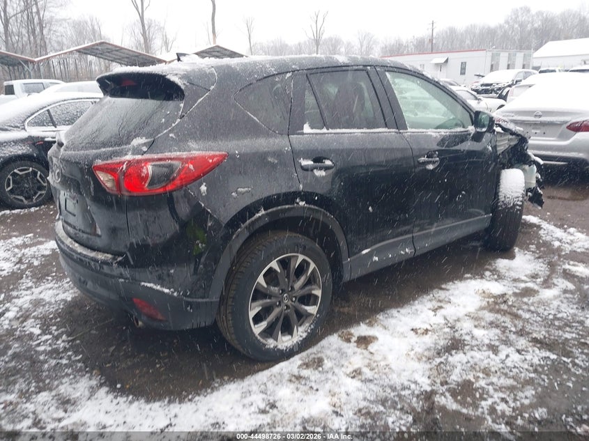 2016 Mazda Cx-5 VIN JM3KE4DY5G0682361 IAAI salvage auction — RIGHT FRONT, Salvage - Greater Than 75% (Maryland), sold $3,350 on 2026-07-14 (photo 4)