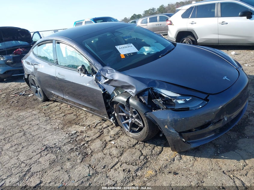 2023 Tesla Model 3 VIN 5YJ3E1EA3PF664018 IAAI salvage auction — FRONT & REAR, Salvage Title, sold $3,650 on 2026-07-09 (photo 1)