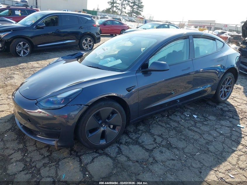 2023 Tesla Model 3 VIN 5YJ3E1EA3PF664018 IAAI salvage auction — FRONT & REAR, Salvage Title, sold $3,650 on 2026-07-09 (photo 2)