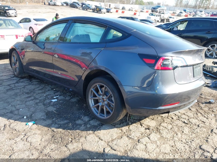 2023 Tesla Model 3 VIN 5YJ3E1EA3PF664018 IAAI salvage auction — FRONT & REAR, Salvage Title, sold $3,650 on 2026-07-09 (photo 3)