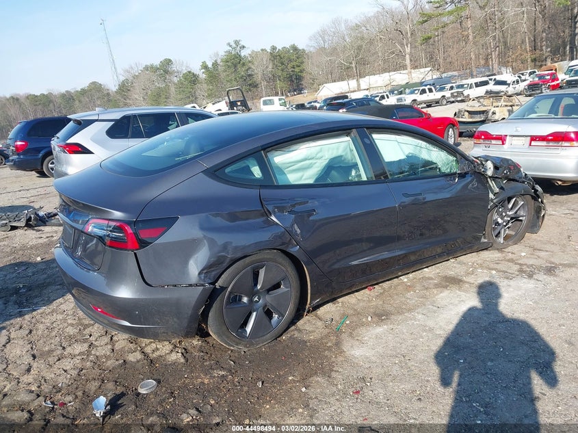 2023 Tesla Model 3 VIN 5YJ3E1EA3PF664018 IAAI salvage auction — FRONT & REAR, Salvage Title, sold $3,650 on 2026-07-09 (photo 4)