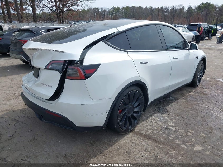 2022 Tesla Model y VIN 7SAYGDEF0NF567680 IAAI salvage auction — REAR END, Other, sold $7,875 on 2026-07-07 (photo 4)