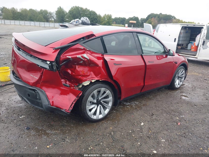 2026 Tesla Model y VIN 7SAYGDEE2TA399655 IAAI salvage auction — REAR END, Salvage (Arkansas), sold $14,850 on 2026-07-29 (photo 4)