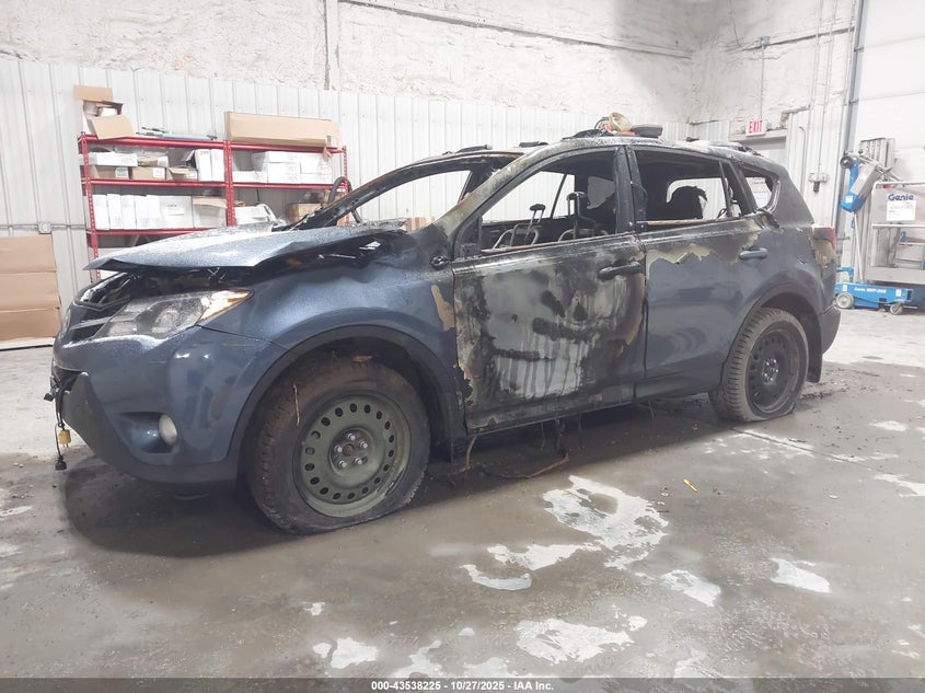 2014 Toyota Rav 4 VIN JTMDFREVXED051093 IAAI salvage auction — TOTAL BURN, Bill Of Sale (Alaska), sold $100 on 2026-07-31 (photo 2)