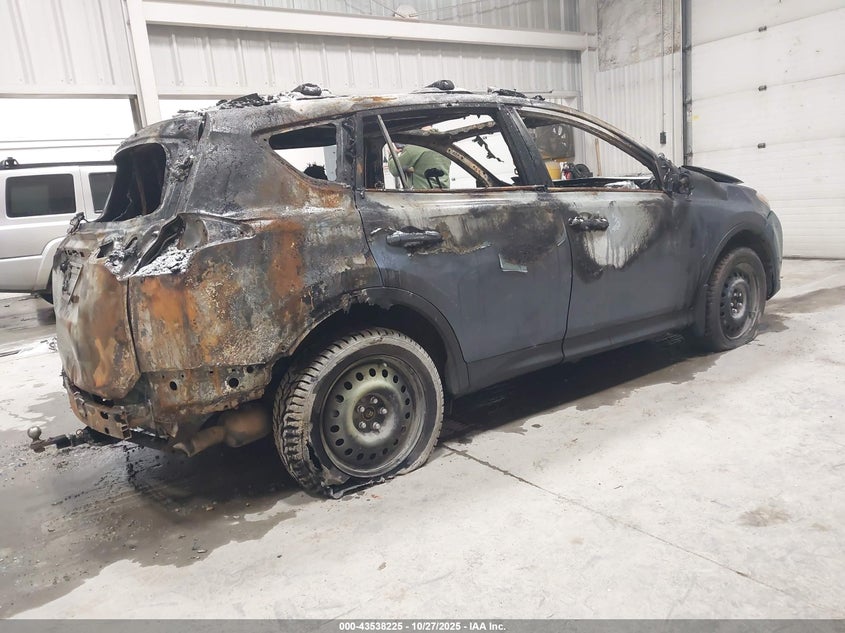 2014 Toyota Rav 4 VIN JTMDFREVXED051093 IAAI salvage auction — TOTAL BURN, Bill Of Sale (Alaska), sold $100 on 2026-07-31 (photo 4)