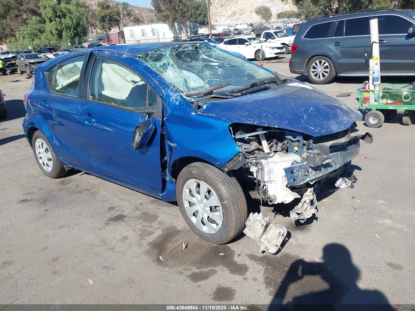 2014 Toyota Prius c VIN JTDKDTB36E1561620 IAAI salvage auction — ROLLOVER, Salvage (California), sold $25 on 2026-07-14 (photo 1)