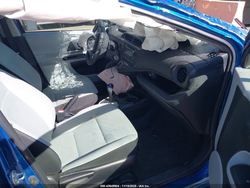 2014 Toyota Prius c VIN JTDKDTB36E1561620 IAAI salvage auction — ROLLOVER, Salvage (California), sold $25 on 2026-07-14 (photo 5)
