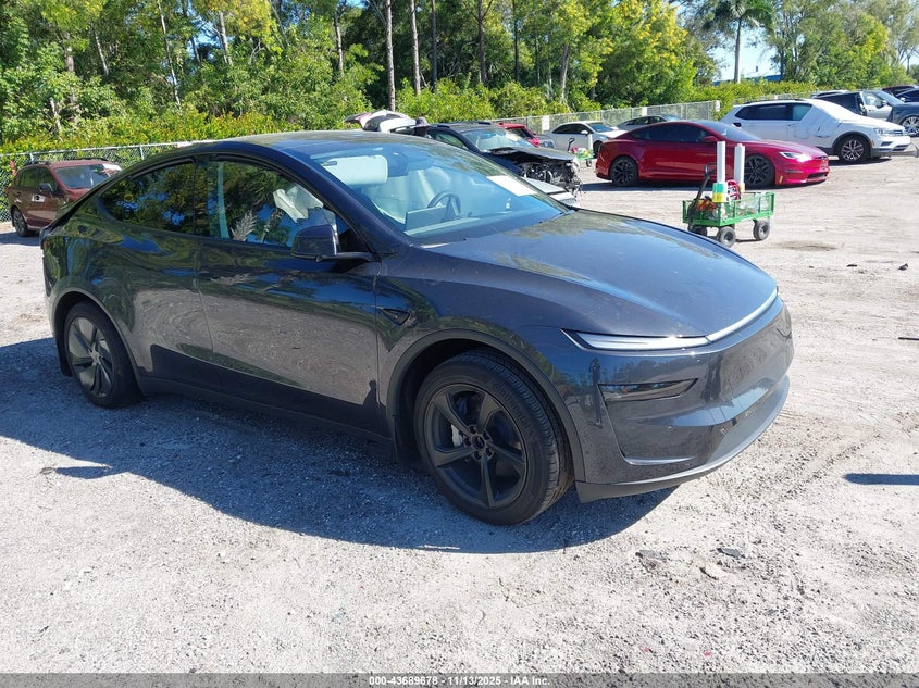 2026 Tesla Model y VIN 7SAYGDED4TF383628 IAAI salvage auction — SIDE, Other, sold $11,100 on 2026-08-02 (photo 1)