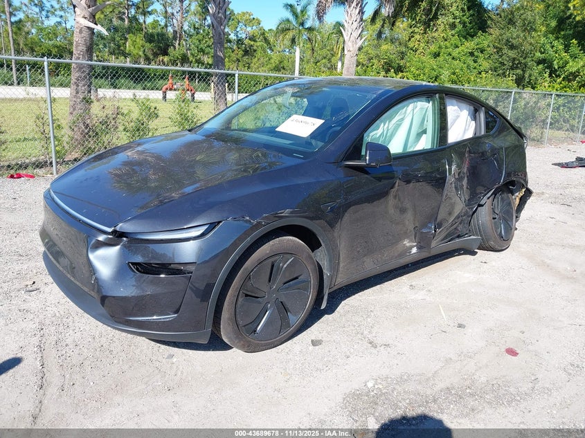 2026 Tesla Model y VIN 7SAYGDED4TF383628 IAAI salvage auction — SIDE, Other, sold $11,100 on 2026-08-02 (photo 2)