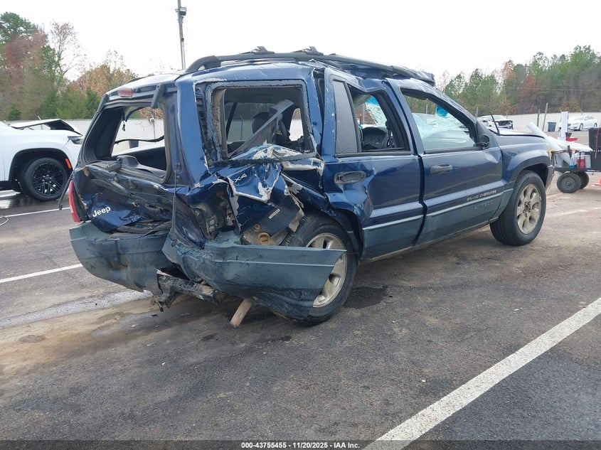 2001 Jeep Grand cherokee VIN 1J4GW48S31C612617 IAAI salvage auction — ROLLOVER, Junking Certificate (Mississippi), sold $75 on 2026-07-09 (photo 4)