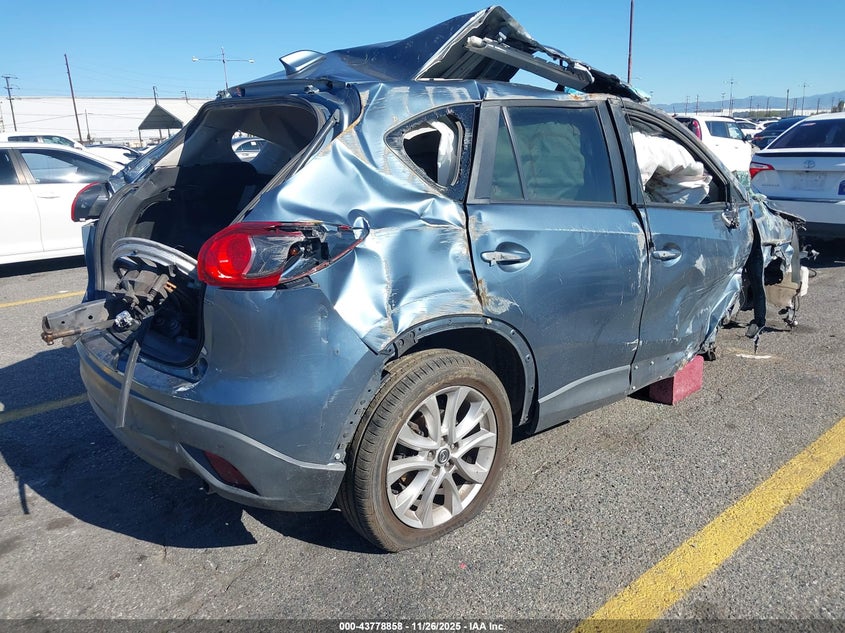 2015 Mazda Cx-5 VIN JM3KE2DY0F0551065 IAAI salvage auction — ROLLOVER, Salvage (California), sold $625 on 2026-07-14 (photo 4)