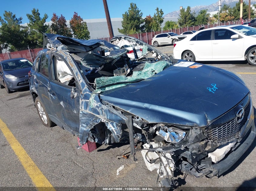 2015 Mazda Cx-5 VIN JM3KE2DY0F0551065 IAAI salvage auction — ROLLOVER, Salvage (California), sold $625 on 2026-07-14 (photo 6)