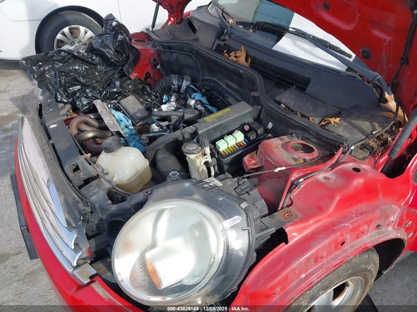2007 Mini Cooper VIN WMWMF33577TL67458 IAAI salvage auction — ENGINE DAMAGE, Clear (Michigan), sold $400 on 2026-07-09 (photo 6)