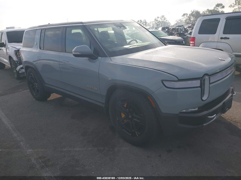 2023 Rivian R1s VIN 7PDSGABA0PN019590 IAAI salvage auction — Rear End, Salvage (California), sold $25,950 on 2025-12-11 (photo 1)
