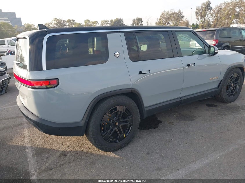 2023 Rivian R1s VIN 7PDSGABA0PN019590 IAAI salvage auction — Rear End, Salvage (California), sold $25,950 on 2025-12-11 (photo 4)