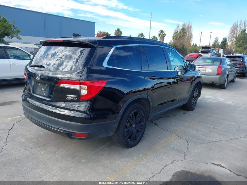 2021 Honda Pilot VIN 5FNYF6H23MB097650 IAAI salvage auction — THEFT, Salvage Title, sold $17,600 on 2026-07-27 (photo 4)
