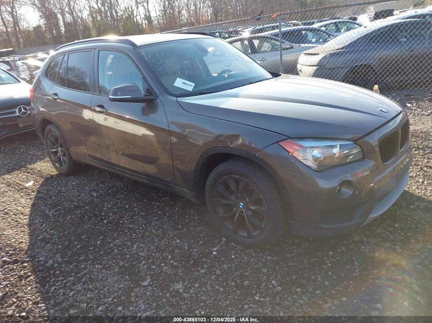 2013 BMW X1 VIN WBAVL1C59DVR87701 IAAI salvage auction — LEFT FRONT, Salvage Title, sold $775 on 2026-07-14 (photo 1)
