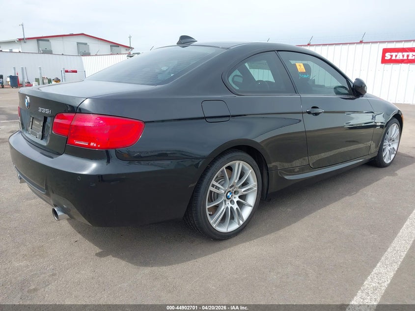 2011 BMW 3er VIN WBAKF9C56BE261817 IAAI salvage auction — BIOHAZARD/CHEMICAL, Salvage (Oregon), sold $3,800 on 2026-07-16 (photo 4)