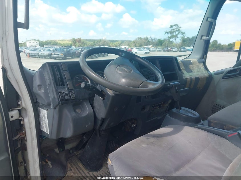 2014 Isuzu VIN JALC4W16XE7001094 IAAI salvage auction — SIDE, Clear (Florida), sold $1,050 on 2026-07-28 (photo 7)