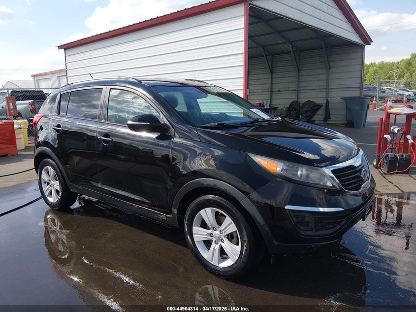 2012 Kia Sportage VIN KNDPB3A23C7307149 IAAI salvage auction — SIDE, Wait Title, sold $1,650 on 2026-07-26 (photo 1)