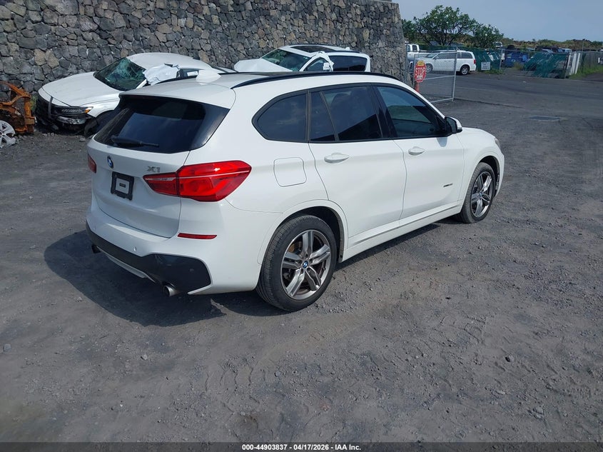 2017 BMW X1 VIN WBXHU7C34H5H38250 IAAI salvage auction — WATER/FLOOD, Salvage (Hawaii), sold $2,225 on 2026-07-14 (photo 4)