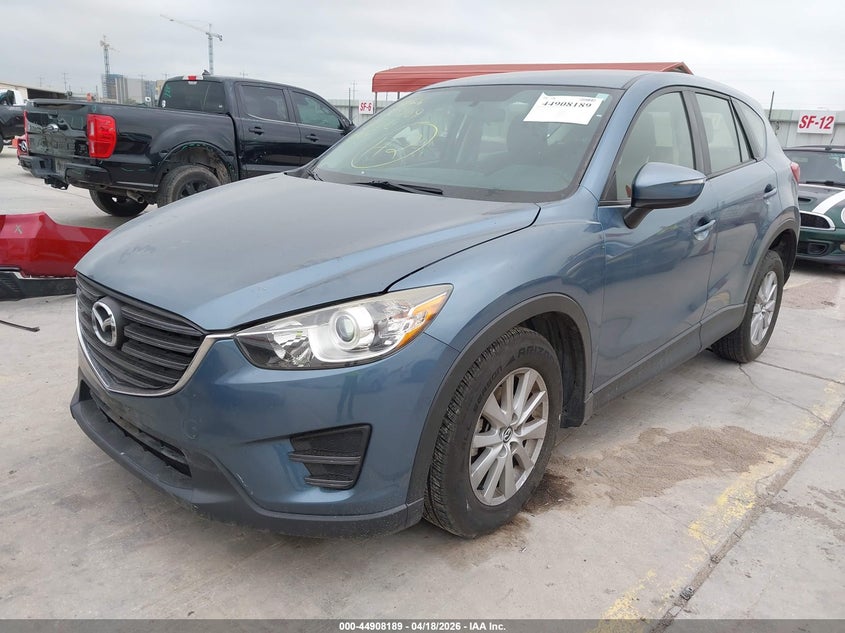 2016 Mazda Cx-5 VIN JM3KE2BY9G0841843 IAAI salvage auction — SIDE, Salvage (Texas), sold $1,500 on 2026-07-08 (photo 2)