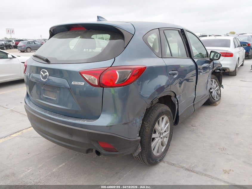 2016 Mazda Cx-5 VIN JM3KE2BY9G0841843 IAAI salvage auction — SIDE, Salvage (Texas), sold $1,500 on 2026-07-08 (photo 4)