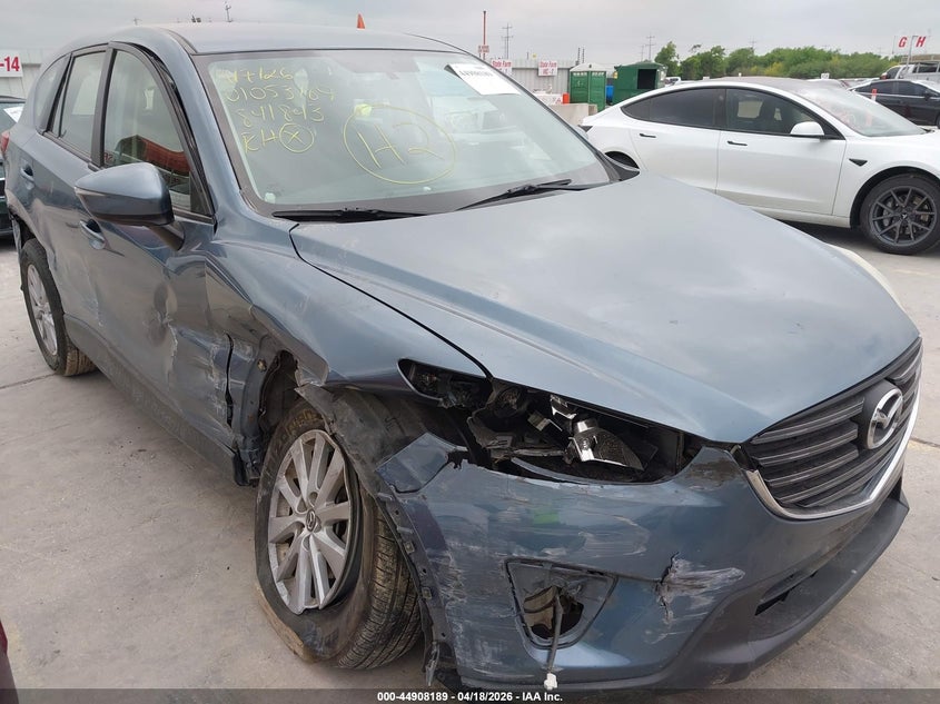 2016 Mazda Cx-5 VIN JM3KE2BY9G0841843 IAAI salvage auction — SIDE, Salvage (Texas), sold $1,500 on 2026-07-08 (photo 6)