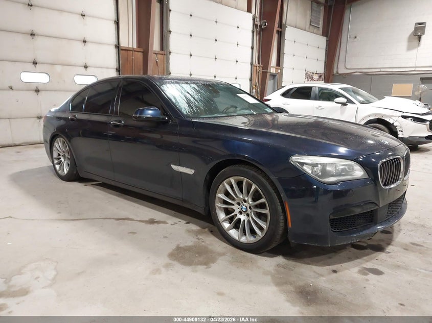 2015 BMW 7er VIN WBAYB6C59FD966126 IAAI salvage auction — LEFT SIDE, Salvage Title, sold $1,750 on 2026-07-08 (photo 1)