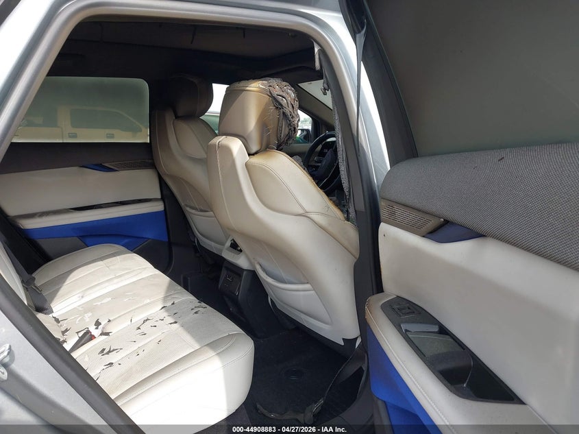 2025 Cadillac Optiq VIN 3GYK3DMR4SS198717 IAAI salvage auction — Burn Interior, Salvage Title, sold $12,100 on 2026-08-17 (photo 8)