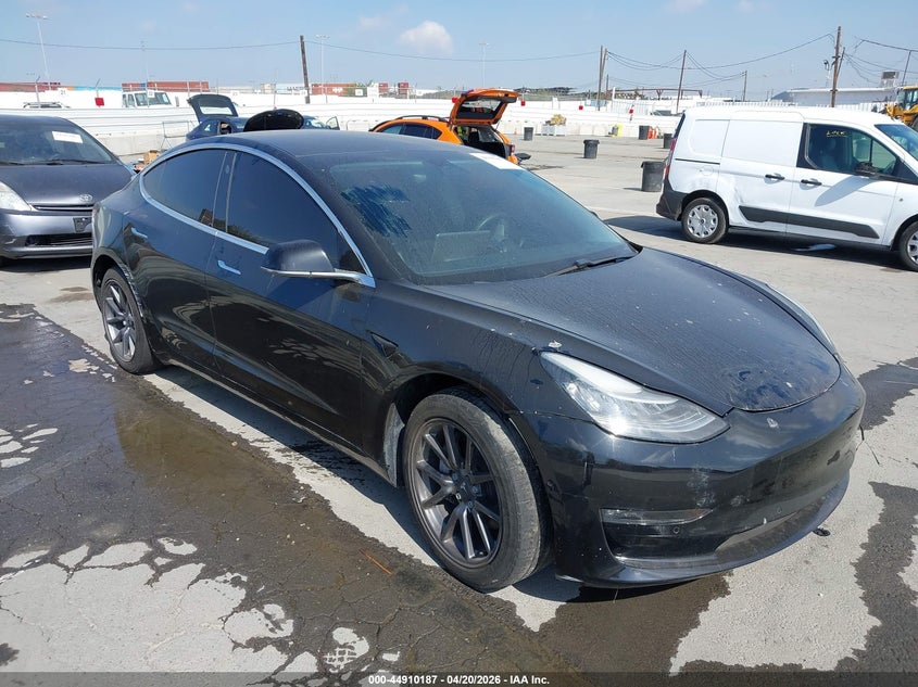 2020 Tesla Model 3 VIN 5YJ3E1EA2LF631702 IAAI salvage auction — LEFT REAR, Salvage Title, sold $3,550 on 2026-07-29 (photo 1)